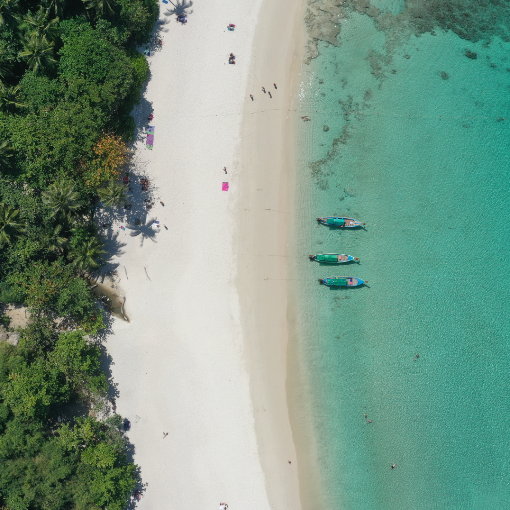 Longtail boats along one of Thailand's beaches